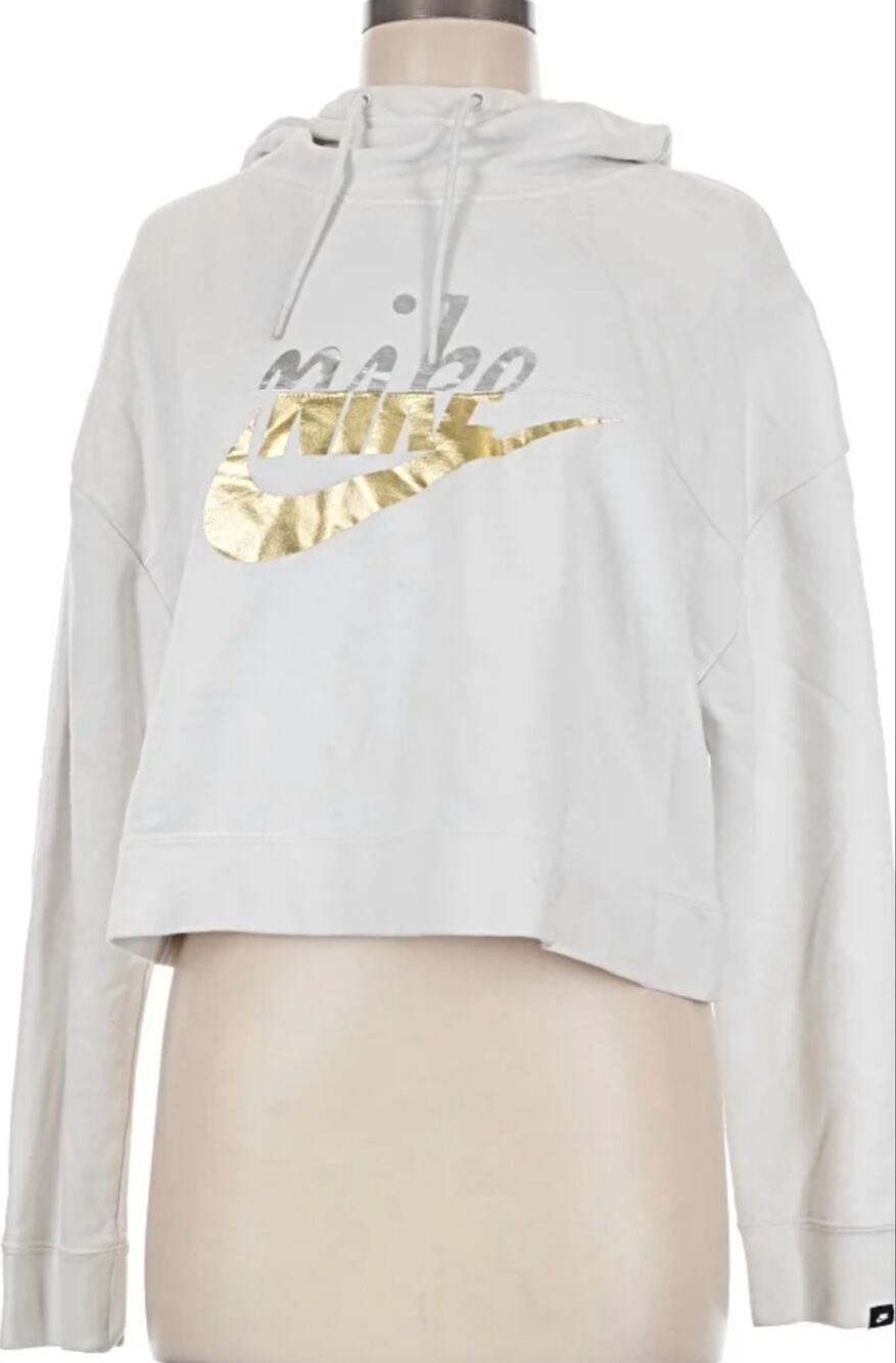 Nike women's cropped hoodie 
shiny metallic gold and silver logo on the front.
